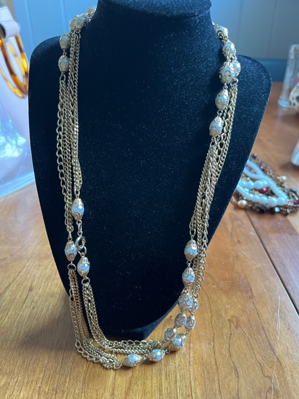 Gold and white necklace